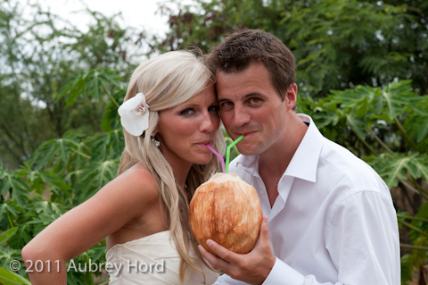 bride and groom drinking fresh coconut juice